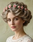 Raccolto con una ghirlanda di rose rosa